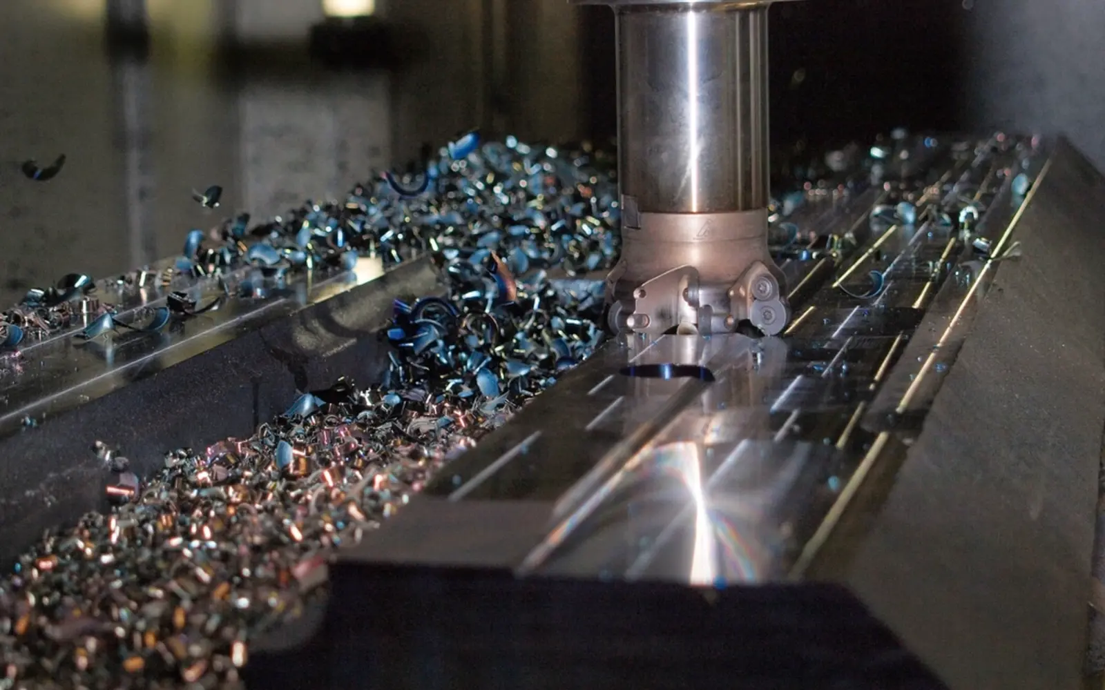 CNC milling machine cutting metal, representing manufacturing website design